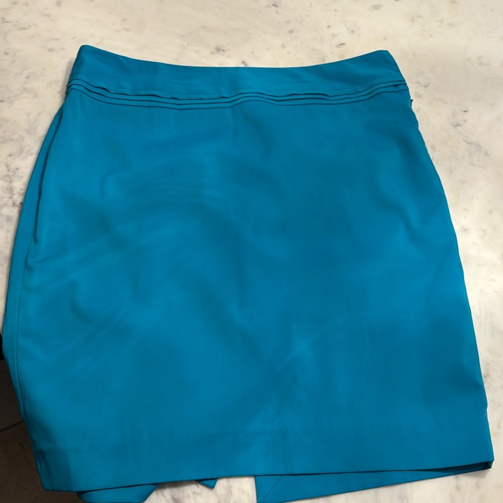 The limited teal pencil skirt